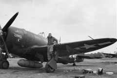 Pilot returns from a raid where he assisted in blowing up a long Germa