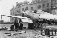 working on a snow covered 47 near Germany hanger. Jan 1945. Belgium