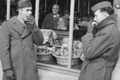 Jim and Bob enjoy Belgium apples