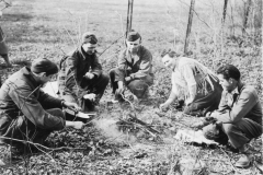 we stop by road. Belgian women seems to like hot dogs. march 1945.