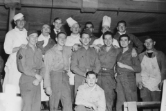 kitchen crew here in our 36th FG Marshall. Belgium. Nov 1944