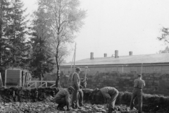 German parishioners crack rocks near Belgium boarder.