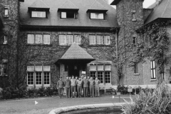 HQ 32 service group officers in front of HQ. Belgium. DEC 1944