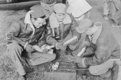 explosive chargers being examined. strip 89. Belgium. Nov 1944