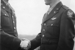 Lt Slater receives the DFC medal from 36th CO. may 25 1944.