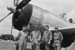 col curry and his crew by his ship. may 1944.