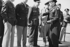 Just before d-day (left to right) 36th officer Gen Spatz Ike, Gen. Le