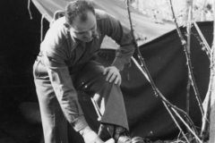 john shines shoes in front of tent. April 1944.