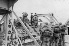 loading into the landing craft which carried us to the Normandy beach.