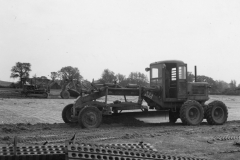 air strip being leveled off. Kingsnorth Kent England. may 1944