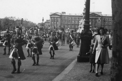 bag pipers parade in front of the palace . England. may 6 1944