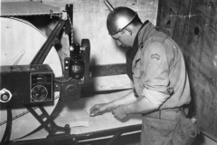 bob feds pictures into our large dryer in the lab. Kingsnorth England.