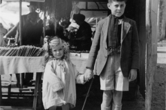 little girl with her brother at Le mars market in France. Aug 1944