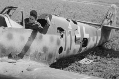 Vaughan Pitman inspects crashed German ME110. France. October 1944