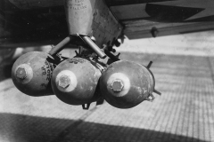 cluster of 3 250lb on a P47. France, Strip 16. Aug 1944.