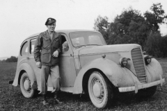 Mr Edwards own red cross man and his faithful car. Sept 1944.