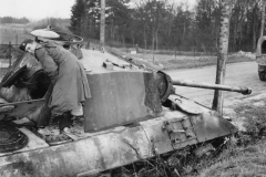 capt wessel inspects a German tank near Paris. Nov 1944