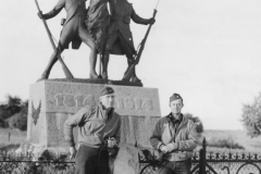 Chaplain Saunders and Major Smith by french monument 1944