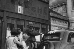 Bernie in french helmet points at FFI vehicle at epernay. Sept 1944.