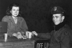 Barbara gives a pilot coffee and doughnuts. Oct 1944.