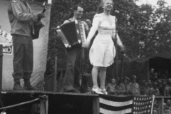 singer in Crosby Astaire show. strip 35. France. Sept 1944.