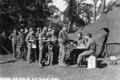 receiving our invasion money prior to leaving to France. July 7 1944.