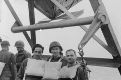 three sad sacks aboard ship en route to France. July 1944. johns and s