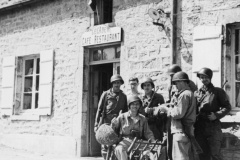 a group of us in front of a Normandy cafe. July 1944.