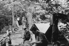 supply boys chain up in pup tent city. July 1944