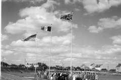 flag raising before a track meet between France and Americans a couple