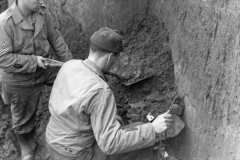 preparing for a 500lb bomb for exploding. Nov 1944