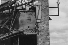 wrecked Normandy home. still living in it. France.