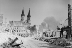 Magdeburg, Germany with battle smoke in the distance. May 1945.