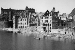 wesser river with the war torn Kassel Germany in the background. May 1