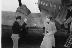 general from the 9th tac greets col Douglas after arriving by c47 at o