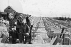 we give a fake Nazi salute in front of German tank barrier. Germany. m