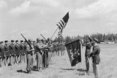 putting the presidential banner on the flag. 36th flight er group. Jun