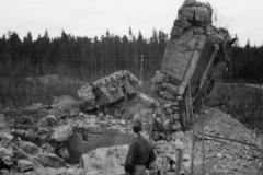 what is left of huge German pill box. cement is 5ft thick. Germany. ma