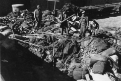 piles of abandoned German clothing. R12. Kassel Germany. may 1945